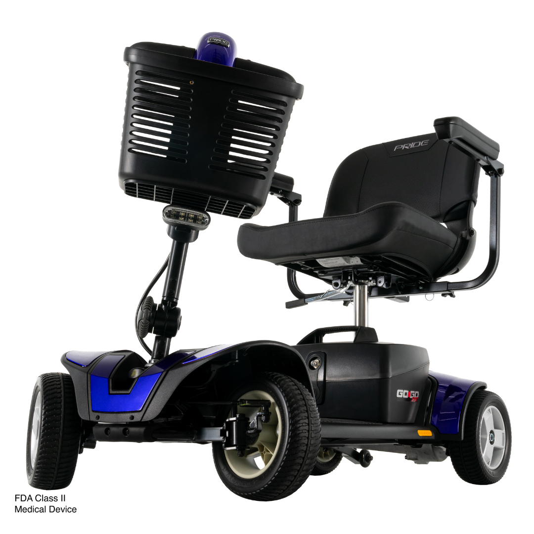 The Pride Go Go® Sport 4-Wheel Scooter is a compact mobility scooter with a black seat, armrests, front basket, sturdy wheels, low base, and is an FDA Class II medical device.