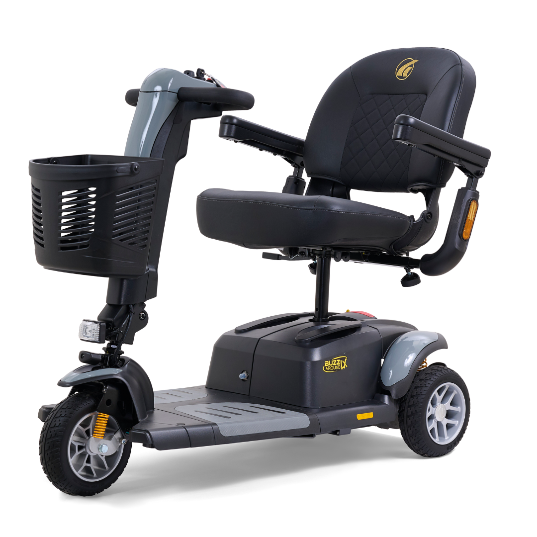 The Golden Buzzaround LX GB119 is a heavy-duty, three-wheel portable mobility scooter that combines luxury with convenience. It features a padded seat, armrests, a front basket, and handlebars to enhance ease of use and accessibility.