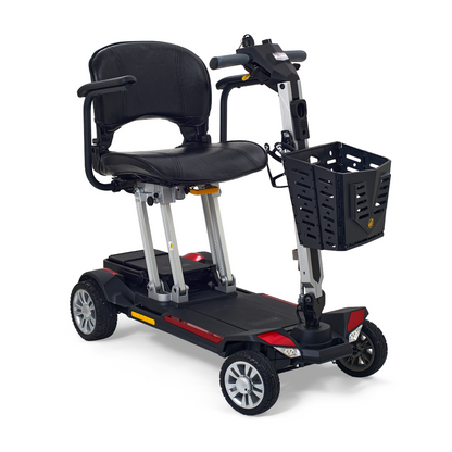 The Golden Technologies Portable Buzzaround GB120 Carry-On Travel Scooter features a fold-flat design with a black seat, armrests, and control handle. It has four wheels and includes a front basket for added convenience, making it ultra-portable for easy transportation and maneuverability. This scooter is powered by an efficient lithium-ion battery.