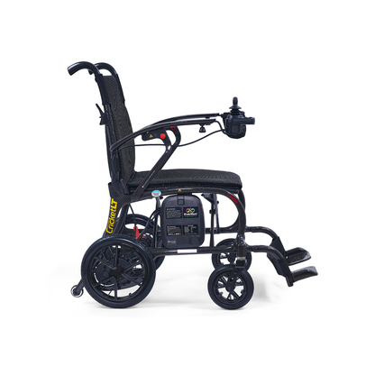 The Golden Cricket™ LT Carbon Portable Lightweight Powerchair (25 lbs) in black features a padded seat, right-armrest joystick, large rear wheels, and footrests, offering exceptional freedom. Shown side view on a white background.