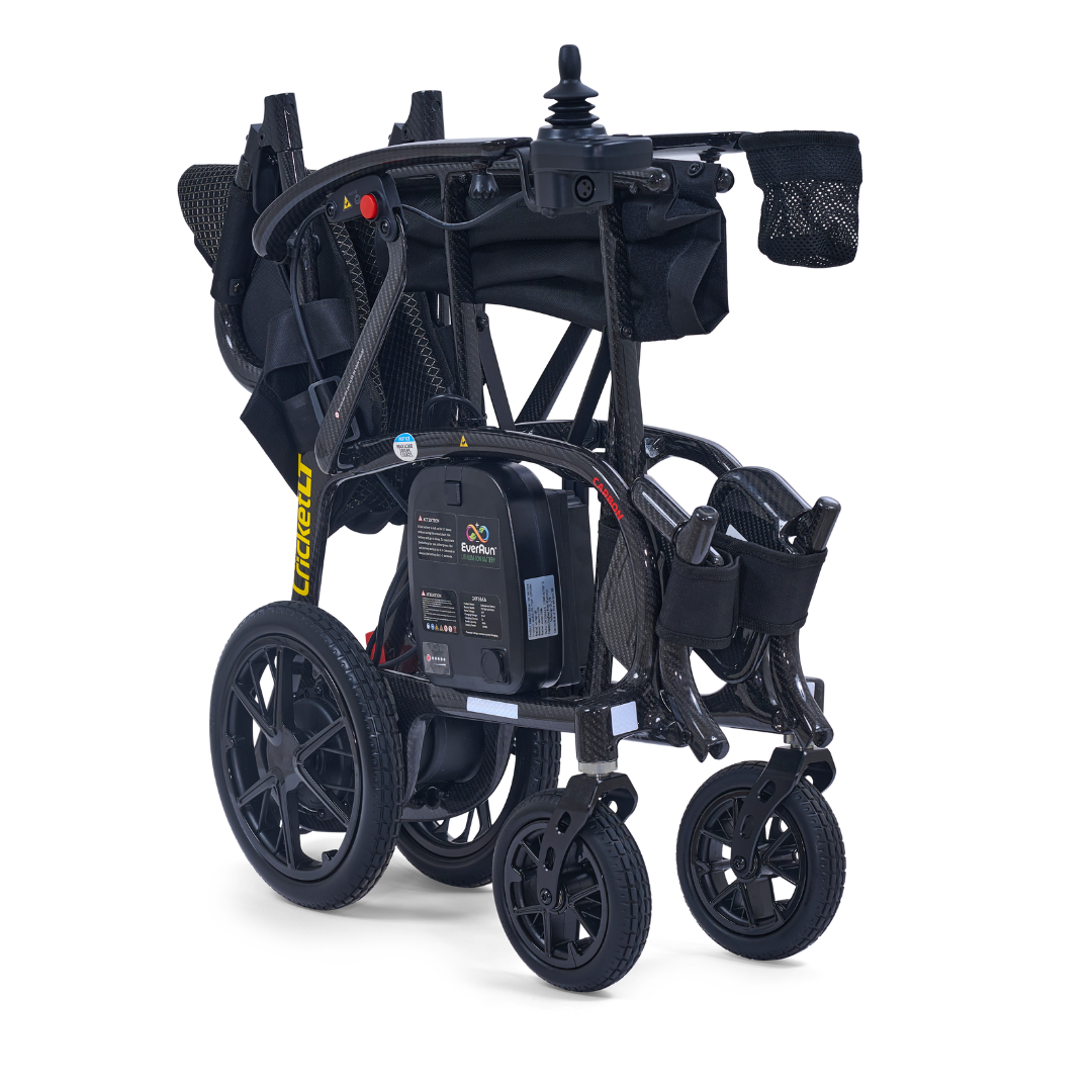 The Golden Cricket™ LT Carbon Portable Lightweight Powerchair weighs just 25 lbs, features large rear wheels, joystick control, storage baskets, and a sleek carbon racket-inspired foldable design for ultimate freedom and easy transport.
