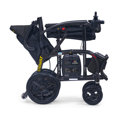 The Golden Cricket™ LT Carbon Portable Lightweight Powerchair weighs only 25 lbs and folds easily; shown from the side folded, it features a black frame, wheels, joystick controller, and signature Golden CricketLT Carbon branding.