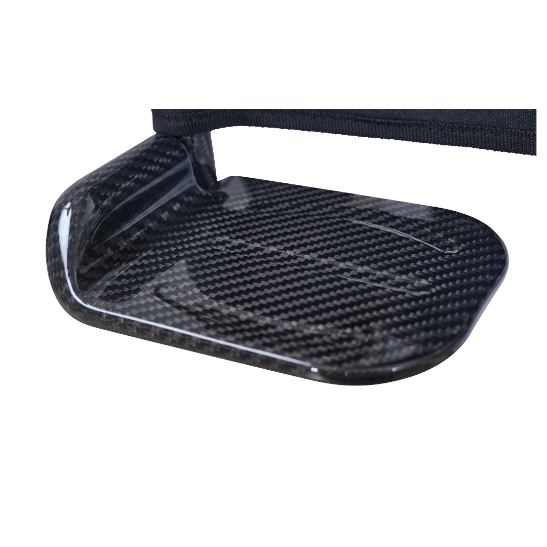 Close-up of the Golden Cricket™ LT Carbon Portable Lightweight Powerchair footplate, showcasing its glossy, textured finish and lightweight 25-lb design for outstanding freedom and performance.
