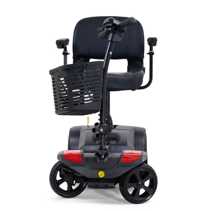 The Golden Tech GB108 Buzzaround LT 4-Wheel Mobility Scooter, shown from the front on a white background, features a compact black design with a lightweight stadium-style seat, cushioned armrests, front basket, and supports up to 300 lbs.