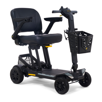 The Golden Buzzaround GB220 CarryOn HD Travel Scooter is a black, heavy-duty 4-wheel scooter with a padded seat, adjustable armrests, front basket, rear mesh storage, and supports up to 400 lbs for accessible personal transport.