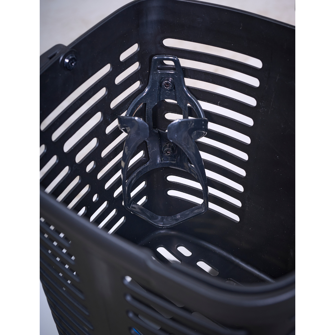 A close-up of a black plastic basket with horizontal slits and an attached bottle holder, designed for use with the Golden Tech Buzzaround GB152 XL+ 4-Wheel Mobility Scooter.