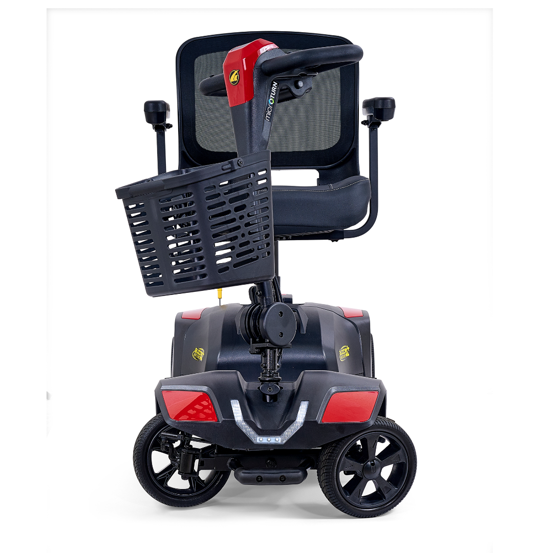 The Golden Tech Buzzaround GB152 XL+ 4-Wheel Mobility Scooter features a black frame with red accents, mesh backrest, and front basket. Pictured from the rear against a white background.