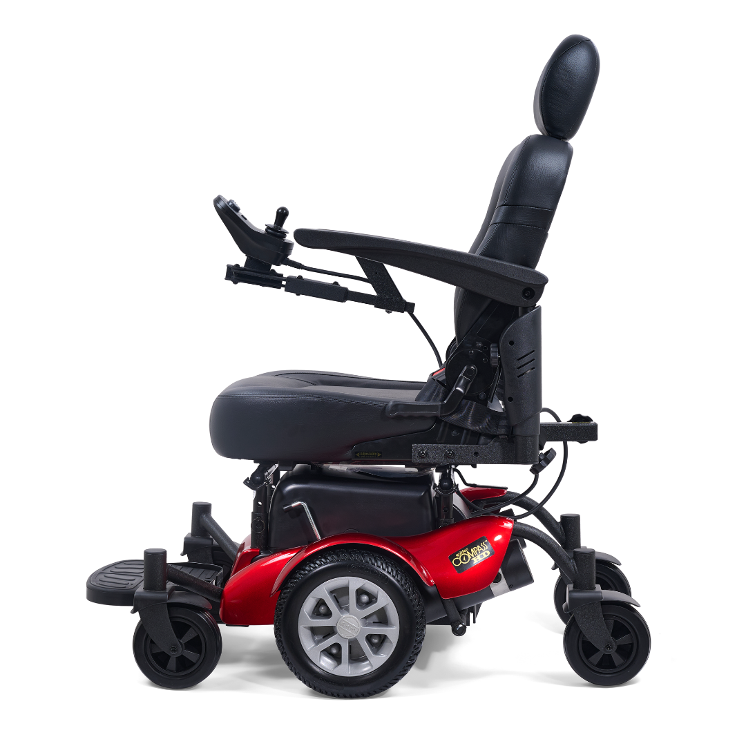 A red and black Golden Tech GP620 Compass HD Bariatric Electric Wheelchair with a padded seat, armrests, right-arm joystick control, and four wheels is shown from the side against a white background.