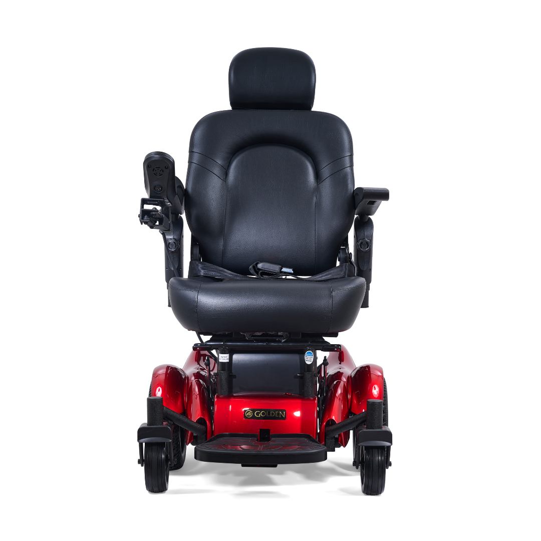 A red Golden Tech GP620 Compass HD Bariatric Electric Wheelchair with a black cushioned seat, backrest, headrest, armrests, and left-side joystick control, viewed from the front.