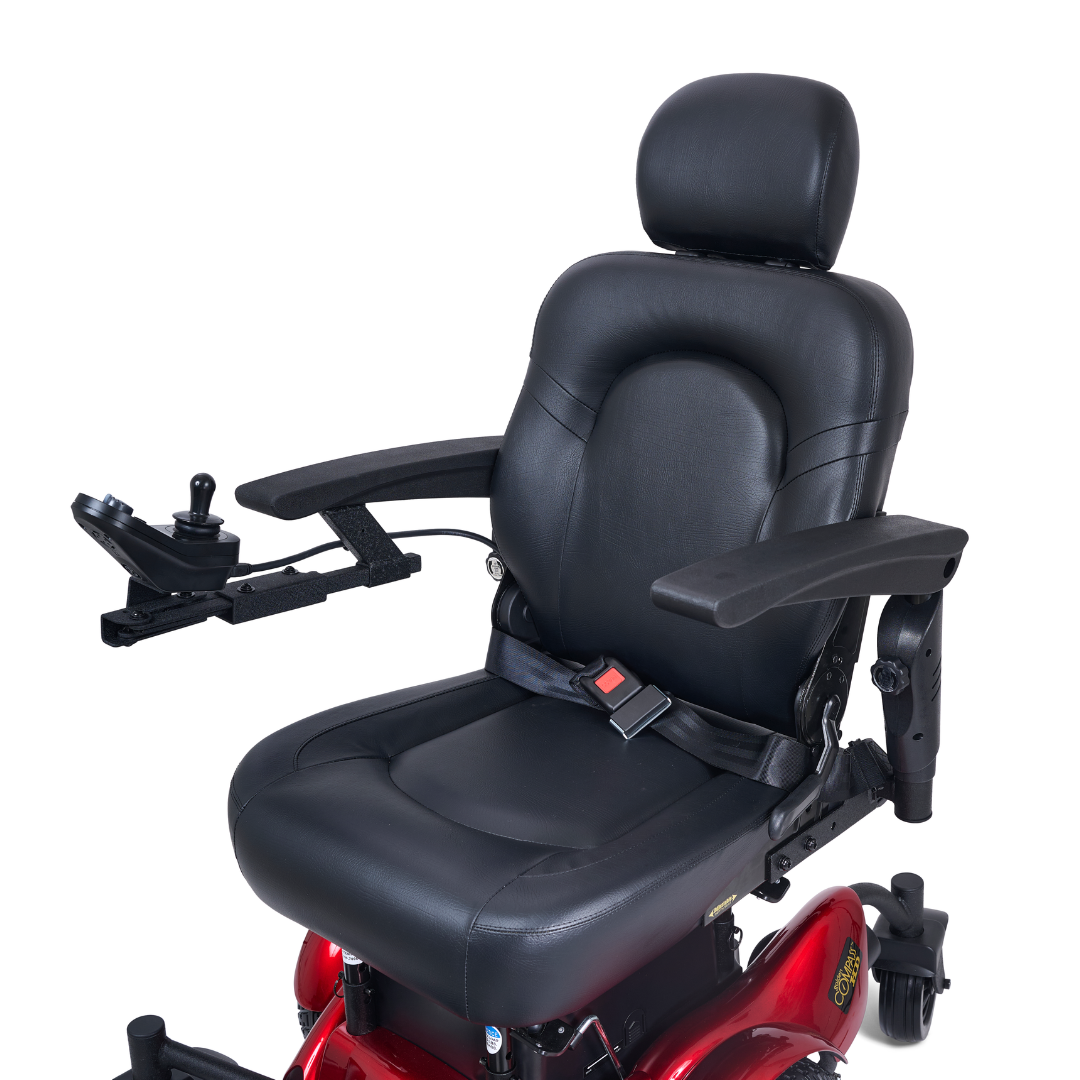 The Golden Tech GP620 Compass HD Bariatric Electric Wheelchair features modern black leather, armrests, a headrest, seatbelt, left-arm joystick control, and a red base.