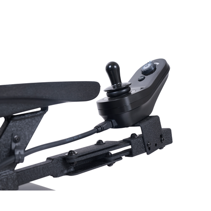 Close-up of a black GP620 joystick control panel with buttons and display, mounted on the armrest bracket of a Golden Tech GP620 Compass HD Bariatric Electric Wheelchair and connected by a visible cable.