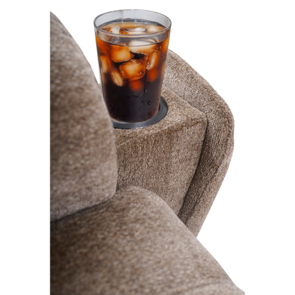 A glass of iced soda sits in a built-in cup holder on the armrest of a brown Golden Tech Halo Power Lift Recliner with Footrest Extension & power Headrest.
