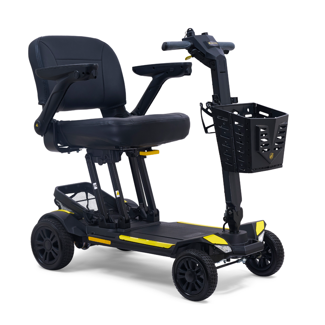 The Golden Buzzaround GB220 CarryOn HD Travel Scooter features a black and yellow design, padded seat with armrests, front basket, handlebars, four wheels, 400 lb weight capacity, and includes a FREE extra battery for easy portability.