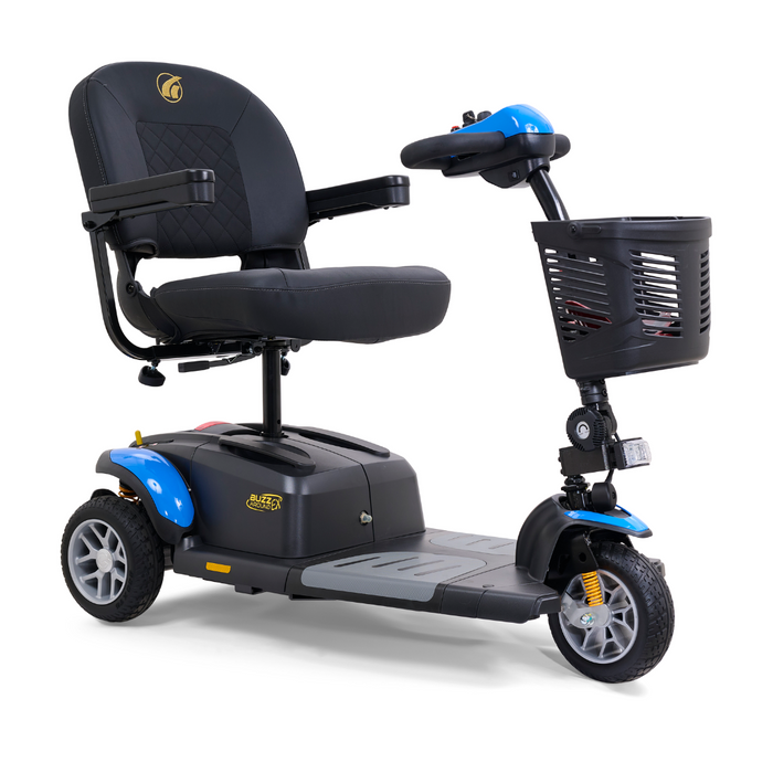 The Golden Tech GB118 Buzzaround EX is a blue and black three-wheel mobility scooter featuring a padded seat with armrests, handlebars with a control panel, and a front basket. This full-size scooter includes shock absorbers for enhanced comfort in personal transportation.