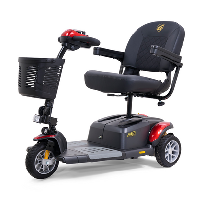 The Golden Tech GB118 Buzzaround EX is a three-wheeled scooter with a black seat, armrests, and a front basket. Its red and black design features a handlebar control panel and a front headlight for convenience.