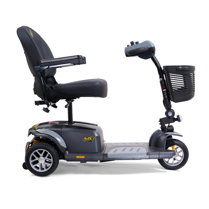 The Golden Tech GB118 Buzzaround EX is a lightweight, black, three-wheeled scooter with a padded seat and armrests. It includes a front basket and an intuitive control panel on the tiller for easy maneuverability and enhanced functionality.