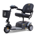 The Golden Tech GB118 Buzzaround EX is a lightweight, three-wheel mobility scooter featuring a black padded seat with armrests, control handlebars, and a front storage basket. Its sleek gray and black design offers both style and functionality.