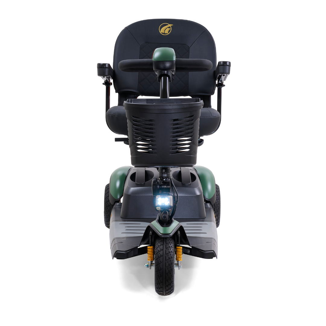 Front view of the Golden Tech GB118 Buzzaround EX Portable Mobility Scooter, with a black seat and steering handle, featuring green and gray accents. Includes a storage basket and prominent headlight for safety.
