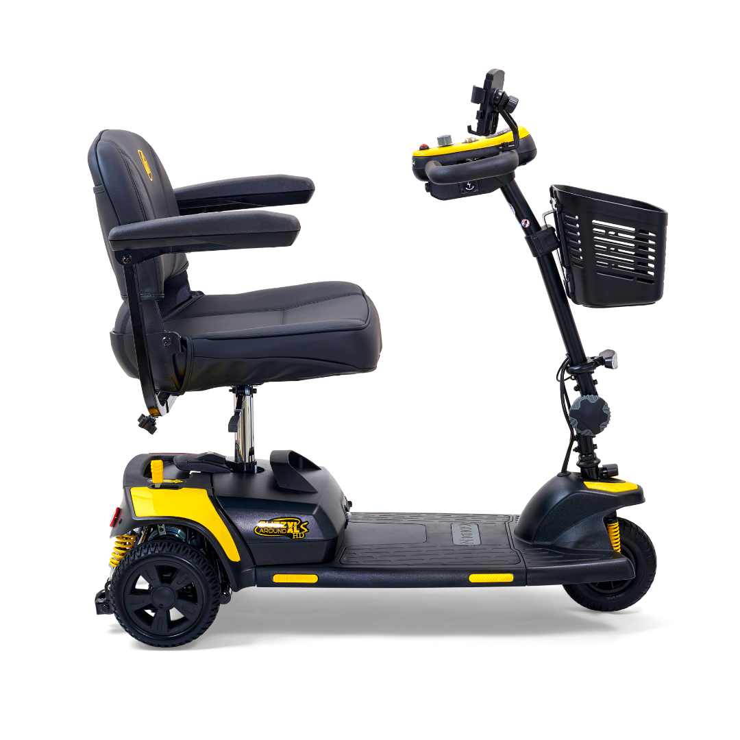 The Golden Tech GB121 Buzzaround XLS HD is a black and yellow 3-wheel mobility scooter with suspension, featuring a padded seat, armrests, front basket, and user-friendly handlebar control panel. Its XR Extended Range Battery ensures longer trips while remaining portable and accessible.