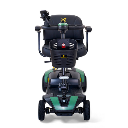 Front view of the Golden Tech GB124 Buzzaround XLS HD, a green and black 4-wheel scooter with a cushioned seat and handlebars. It features a Delta tiller for easy maneuvering, a control panel with the manufacturers logo, and Comfort Spring Suspension for a smooth ride.