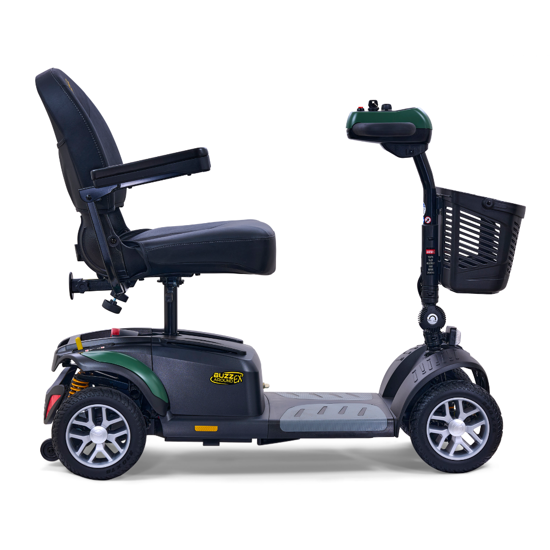 The Golden Tech GB148 Buzzaround EX Portable Mobility Scooter features a plush black seat with armrests, a front basket, and four wheels. Its sleek gray body with green accents ensures comfort without being bulky. In profile, it confidently faces left.