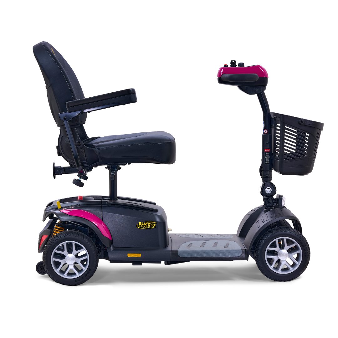 Side view of a Golden Tech GB148 Buzzaround EX Portable Mobility Scooter in black and red, featuring a padded seat, armrests, foot platform, four wheels, front basket, and control panel with handlebars for personal transportation.
