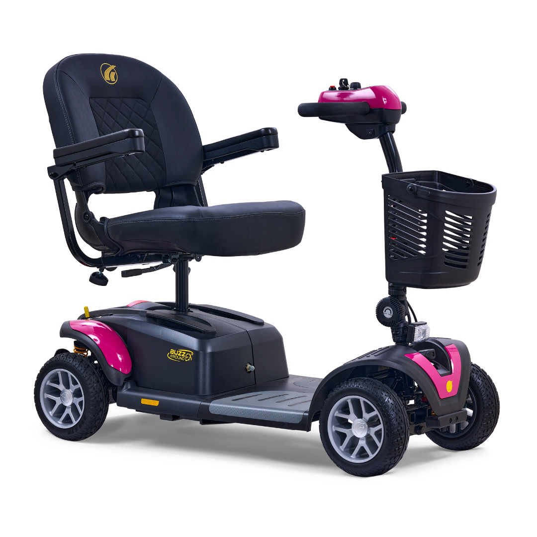 The Golden Tech GB148 Buzzaround EX Portable Mobility Scooter, available in black and pink, features four wheels, a cushioned seat with armrests, a convenient front basket, and user-friendly handlebar controls. Its robust tires offer stability, delivering both style and practicality in a full-size scooter.
