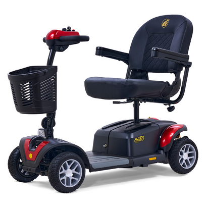 The Golden Tech GB148 Buzzaround EX Portable Mobility Scooter provides comfort with its padded seat, armrests, and backrest. This full-size scooter boasts four wheels, handlebars, a front basket, and red accents on a sleek black body.