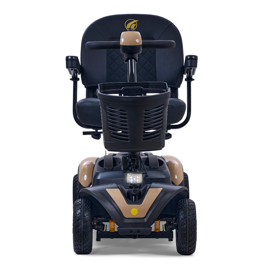 Front view of the Golden Tech GB148 Buzzaround EX Portable Mobility Scooter in black and tan. This full-size scooter includes armrests, a high backrest, a front basket, and visible suspension with wheels for a robust design that combines style and functionality.