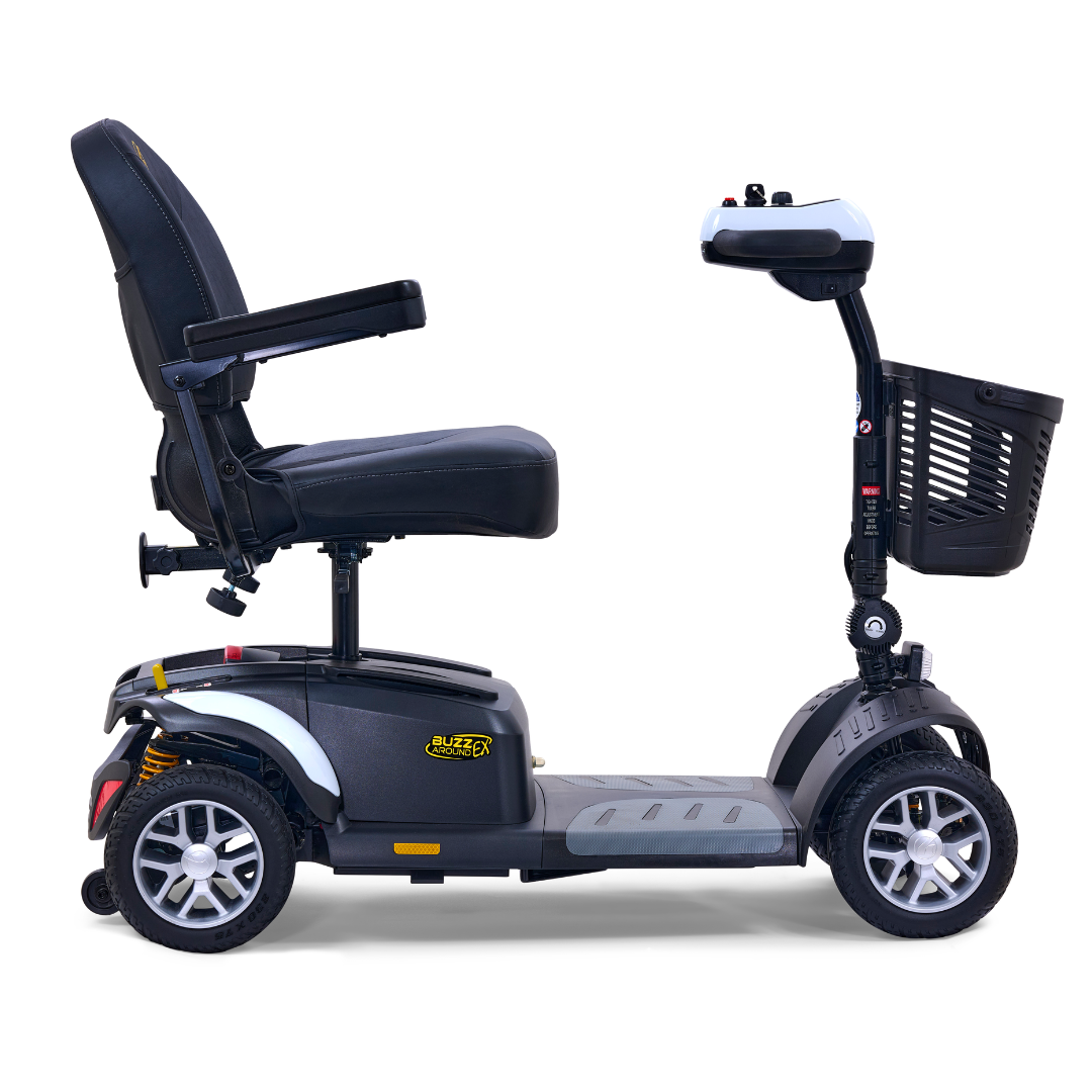 The Golden Tech GB148 Buzzaround EX Portable Mobility Scooter is a modern, full-size mobility scooter featuring a black seat, armrests, and a front basket. It has four wheels with an elegant silver and black frame and is displayed in profile against a white background.