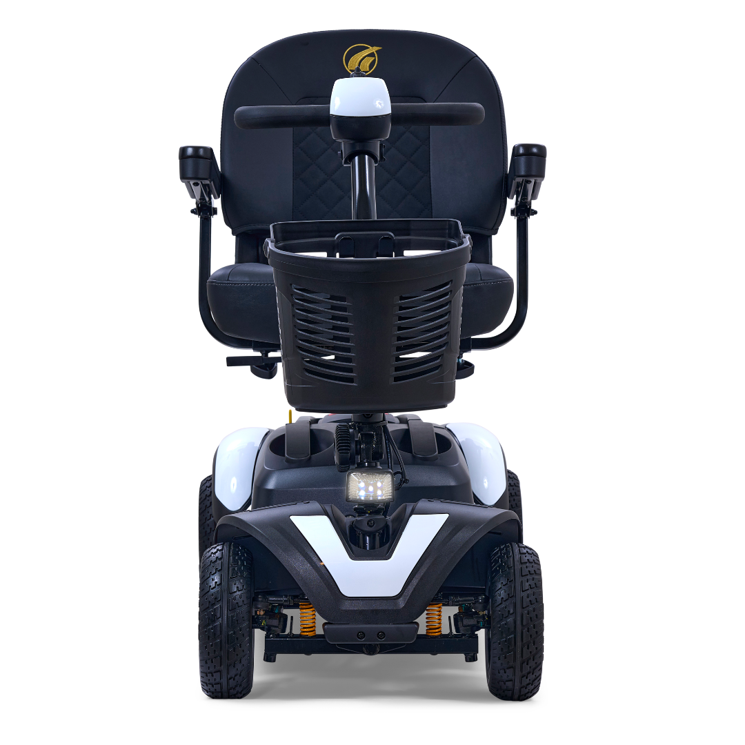Front view of the Golden Tech GB148 Buzzaround EX Portable Mobility Scooter featuring a plush black seat, armrests, and a front basket. This stylish full-size scooter comes in black and white with four wheels and a headlight.