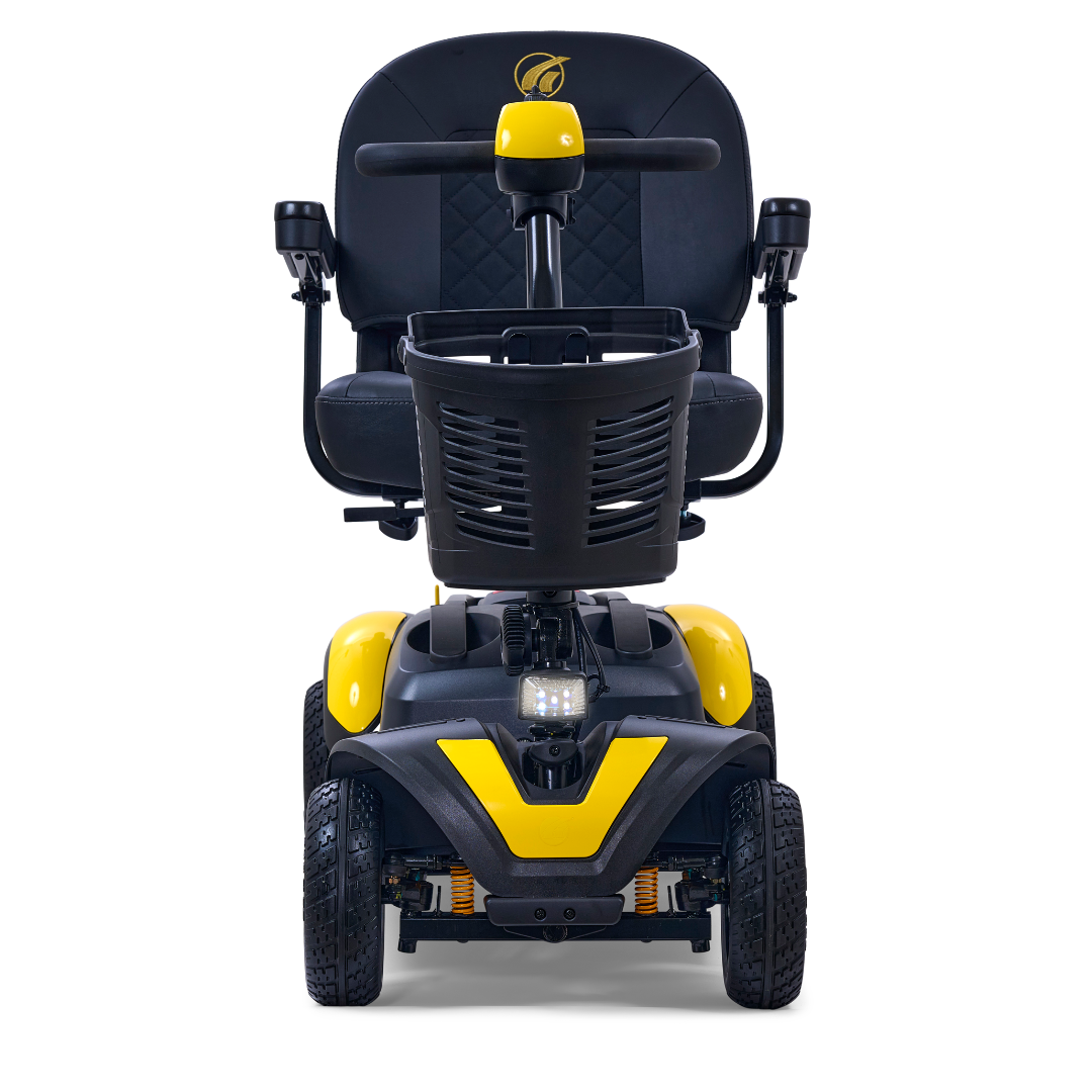 The front view of the Golden Tech GB148 Buzzaround EX reveals a sleek, modern design in black and yellow with a comfy seat, armrests, handlebar, and front basket. This full-size portable scooter is perfect for combining style with functionality thanks to its sturdy wheels.