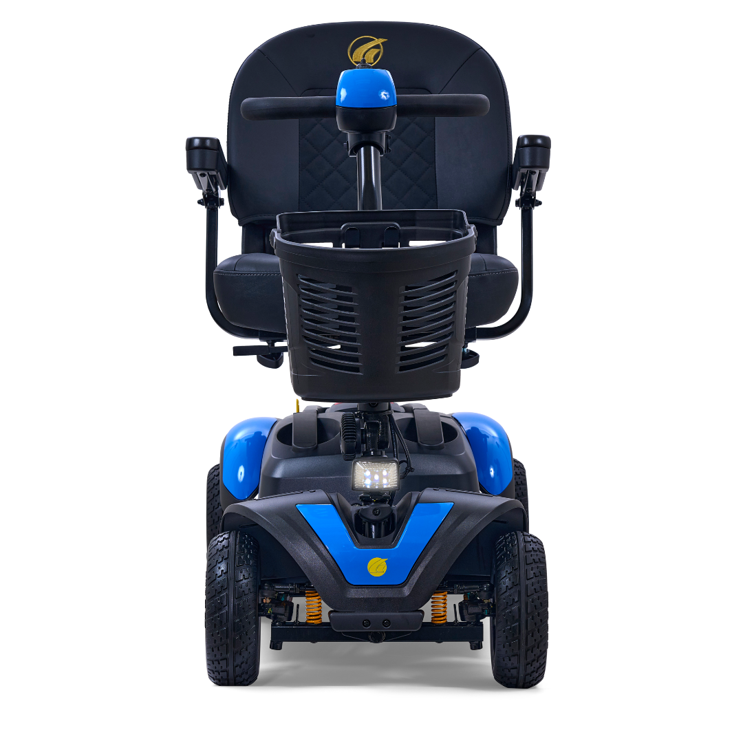 The Golden Tech GB148 Buzzaround EX Portable Mobility Scooter in blue features a cozy black seat, front basket, and thick wheels. Seen from the front, it showcases its sturdy design and accessibility, all while remaining lightweight.