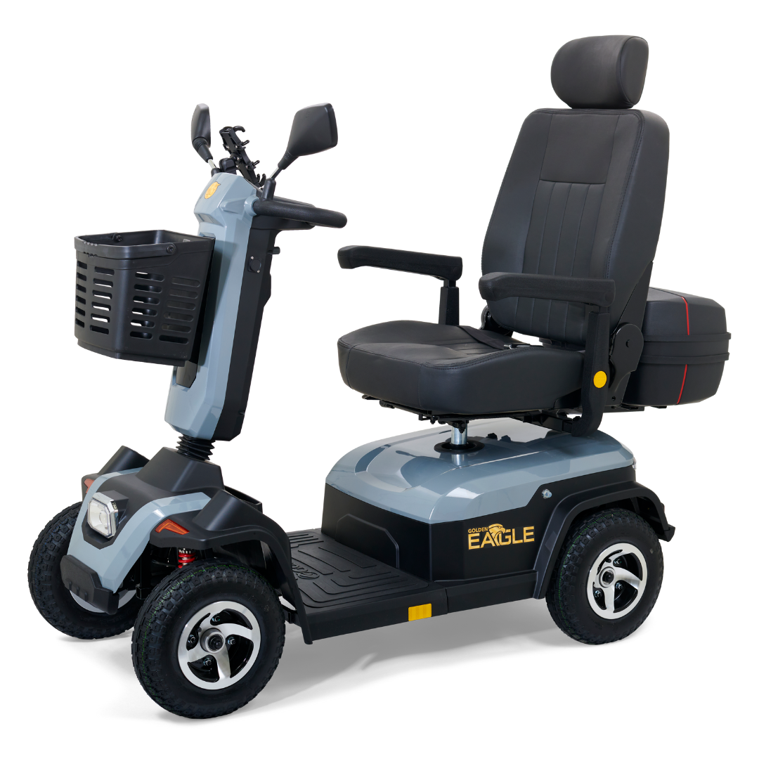 The Golden Tech Eagle HD Bariatric 4-Wheel Scooter with Suspension features a black padded seat, armrests, and high backrest for comfort. With four wheels, rearview mirrors, a front basket, and a dark gray body, it offers enhanced stability and exceptional off-road performance.