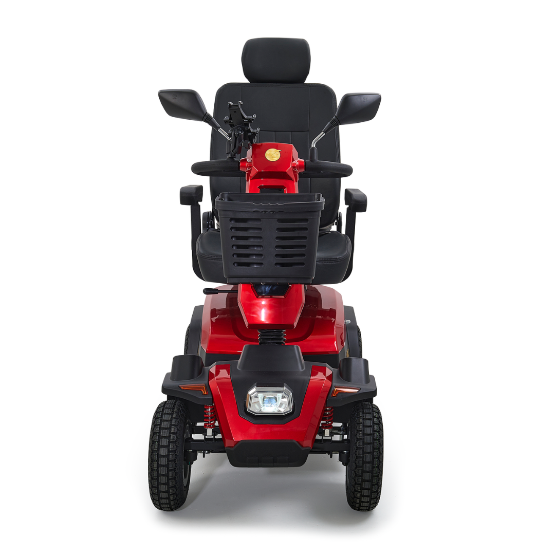 Front view of the Golden Tech Eagle HD Bariatric 4-Wheel Scooter in red, showcasing a padded black seat, handlebars, mirrors, and four wheels. It features a low-mounted headlight and front storage basket for impressive off-road performance.