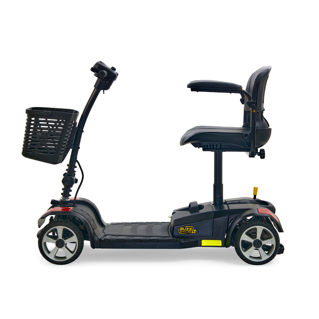 A side view shows the Golden Tech GB108 Buzzaround LT, a black 4-wheel mobility scooter featuring a padded seat, handlebars, and front basket. The streamlined design includes reflective wheel accents and is an FDA-approved medical device for peace of mind.