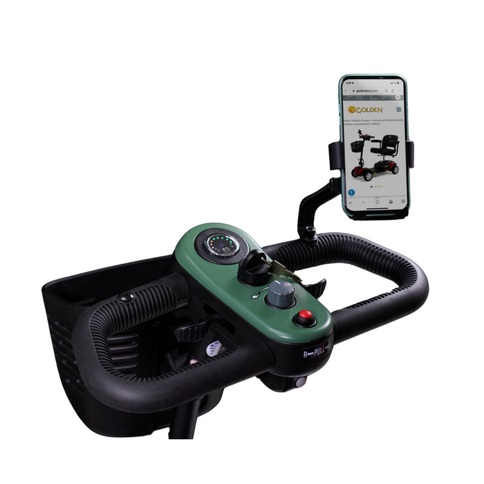 Close-up of the handlebars on a Golden Tech GB121 Buzzaround XL 3-Wheel Portable Mobility Scooter features a control panel with a speed dial and buttons. A smartphone in its holder displays the Golden Technologies website, and part of the basket is visible, suggesting its extended range capabilities.