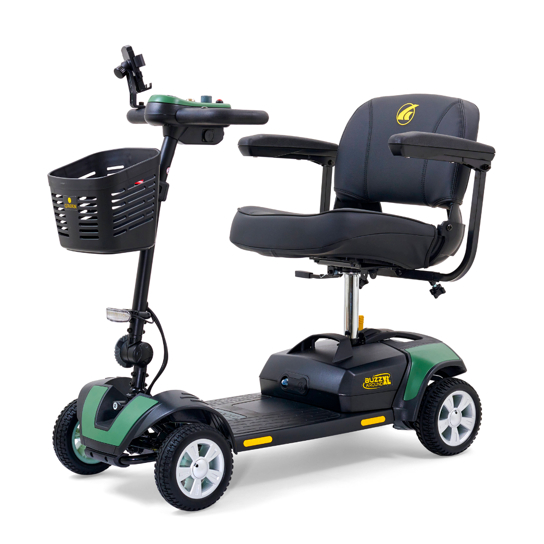 The Golden Tech GB124 Buzzaround XL 4-Wheel Portable Mobility Scooter offers an extended range battery, four wheels, a cushioned black seat with armrests, a front storage basket, and handlebar controls. It features a green and black design with a small headlight below.