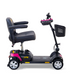 The Golden Tech GB124 Buzzaround XL 4-Wheel Portable Mobility Scooter, featuring a cushioned seat, armrests, and handlebar in black and pink, offers improved maneuverability for personal transport with its four wheels and a small basket near the handlebars.