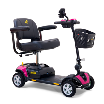Introducing the Golden Tech GB124 Buzzaround XL, a stylish four-wheel portable scooter with pink and black accents. It offers an increased range, better maneuverability, cushioned seat with armrests, a front basket, and control panel handlebar atop small durable wheels for indoor/outdoor use.