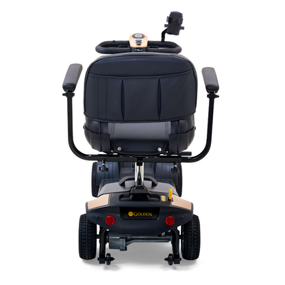 Rear view of the Golden Tech GB124 Buzzaround XL 4-Wheel Portable Mobility Scooter, featuring its backrest, handlebars with controls, seat cushion, and the Golden logo. With an extended range battery and stunning black and beige design, it offers superior maneuverability on four wheels.