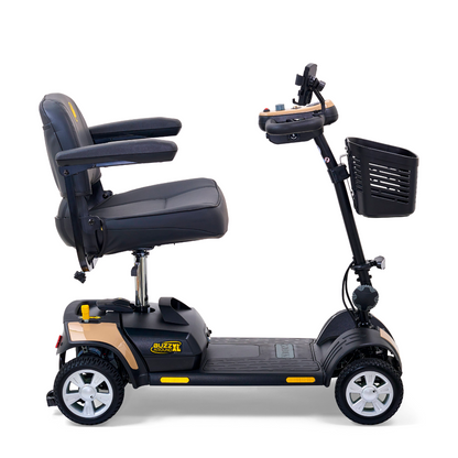 The Golden Tech GB124 Buzzaround XL 4-Wheel Portable Mobility Scooter enhances maneuverability with its padded seat, armrests, and control panel. It includes four wheels, a front basket for storage, and a stylish black frame with gold accents. The extended-range battery supports longer journeys.