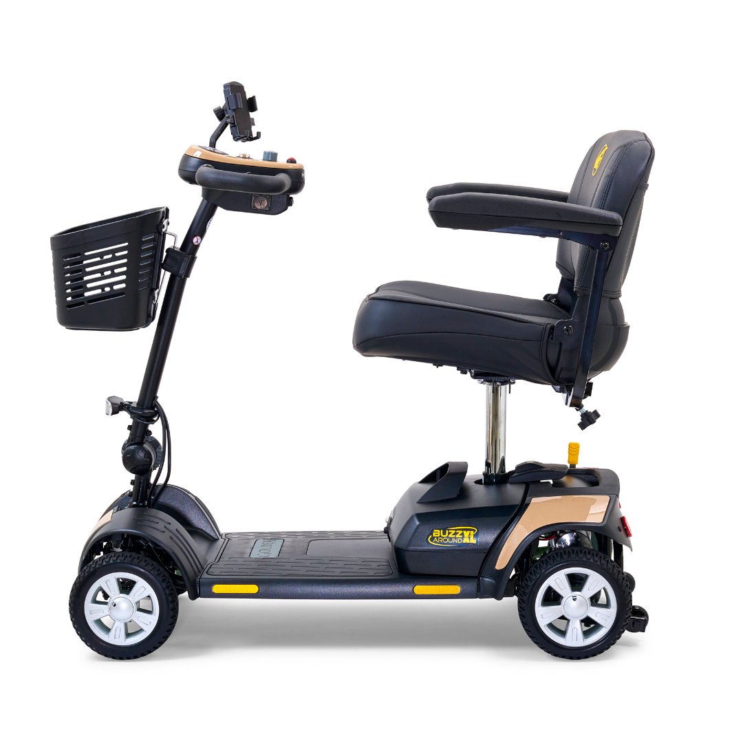 The Golden Tech GB124 Buzzaround XL 4-Wheel Portable Mobility Scooter side view highlights a comfy seat with armrests, an extended range battery, sleek black body, front basket, LED angle-adjustable headlights, and large wheels for smooth rides.