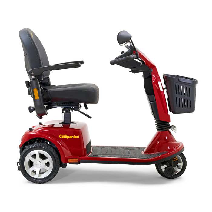 The Golden Tech GC340 Companion Full-Size Bariatric Mobility Scooter is red with a profile view, featuring a high-back stadium-style black seat with armrests, control handlebars, a small front basket, sturdy wheels, and an adjustable tiller for customizable comfort.