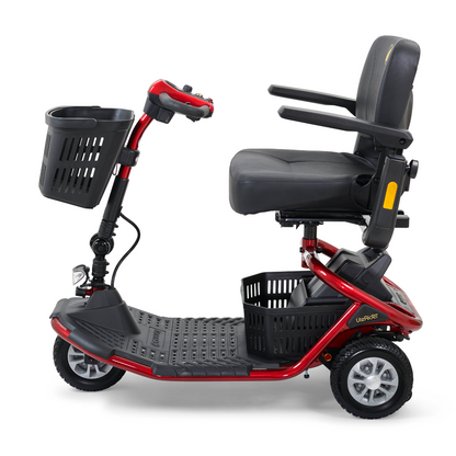 The Golden Tech GL111 LiteRider 3-Wheel Mobility Scooter showcases a sleek red design with a black seat, armrests, and front basket. Featuring a Delta Tiller and black floorboard for comfort and style, it also includes a back basket for added functionality, elegantly displayed from the side view.