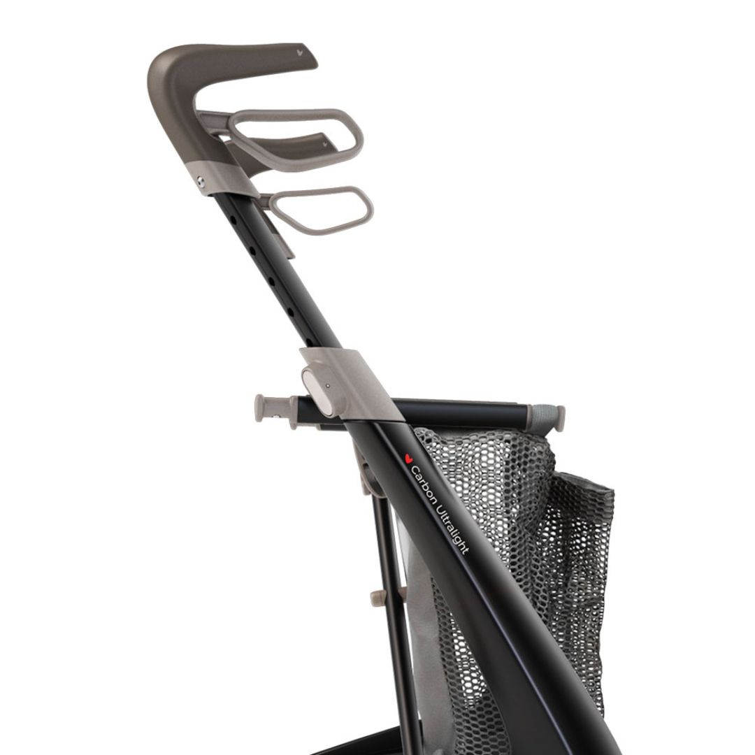 A close-up side view of a black and gray byACRE rollator handle with ergonomic grip, two cup holders, and a mesh bag—perfect for featuring the Grocery Bag For ByAcre Carbon Fiber Rollators as an accessory.