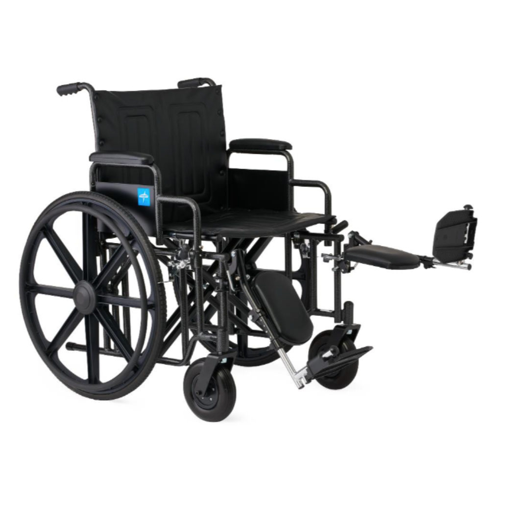 The Medline Guardian Extra-Wide Bariatric Wheelchair is a black manual chair with large rear wheels, elevated footrest, padded armrests, fabric backrest, and heavy-duty support for bariatric users up to 500 lbs.