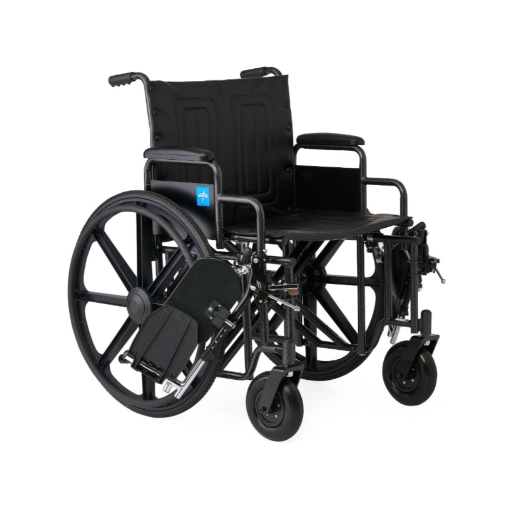 The Medline Guardian Extra-Wide Bariatric Wheelchair is a black manual chair with large rear wheels, small front caster wheels, footrests, armrests, and a blue accessibility symbol, supporting users up to 500 lbs.