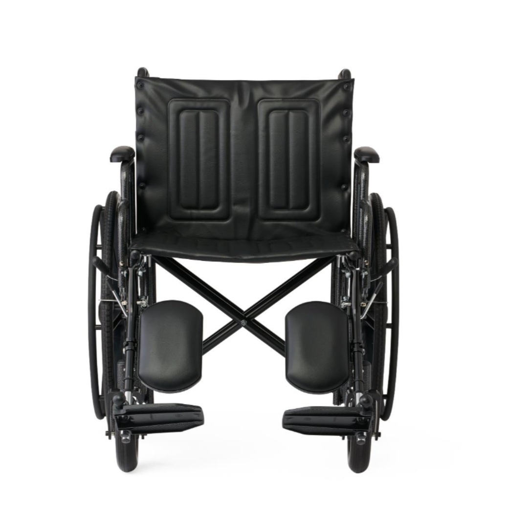 The Medline Guardian Extra-Wide Bariatric Wheelchair is shown from the front, with large rear wheels, small front wheels, padded seat and backrest, elevated footrests, and supports up to 500 lbs. The black chair is set against a white background.
