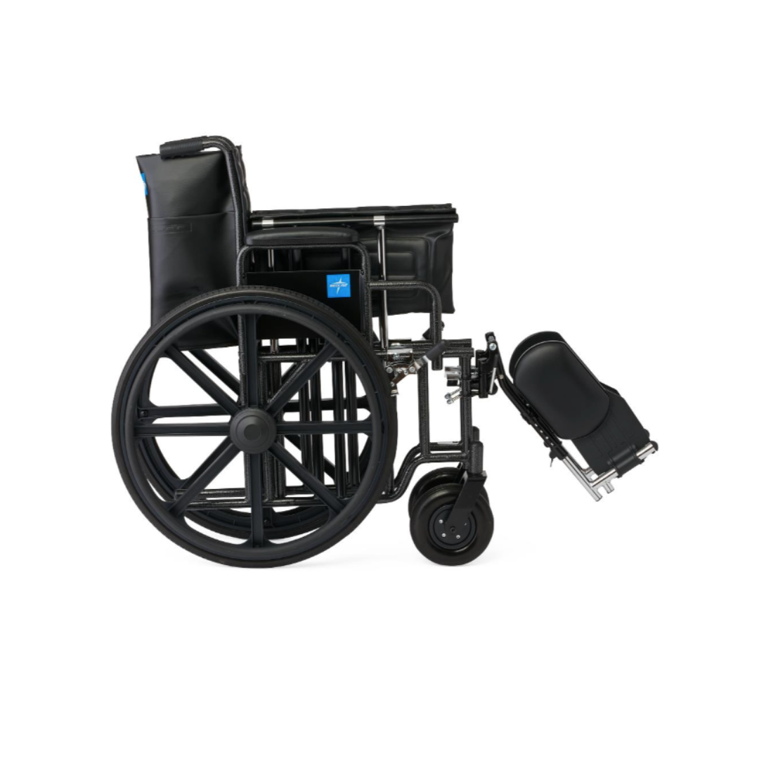 The Medline Guardian Extra-Wide Bariatric Wheelchair, shown in profile on a white background, is black with large rear wheels, small front wheels, elevated leg rests, and supports up to 500 lbs for heavy-duty bariatric use.